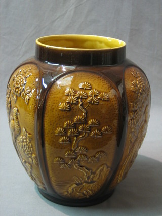 A brown glazed Sylvac pottery vase decorated birds in trees, base marked 539 Sylvac 9"
