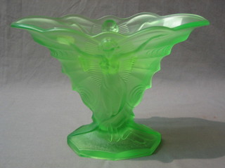 An Art Deco green impressed  glass boat shaped vase decorated a standing lady with arms outstretched  12"