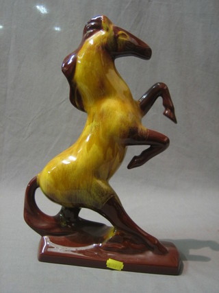 A Canadian Blue Mountain figure of a rearing horse 14"