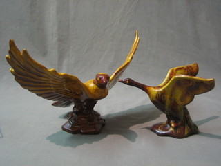 A Canadian Blue Mountain pottery figure of a Goose with wings outstretched 7" and a do. owl (2)