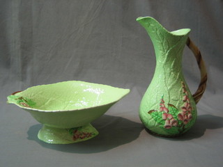 A Carltonware leaf shaped pottery jug 10" (cracked) and a do. dish 11"