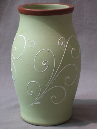 A Denby green glazed pottery vase 8"