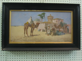 J Coulson, oil on canvas "Desert Oasis with Figures" signed and dated 1923 9 1/2" x 19"