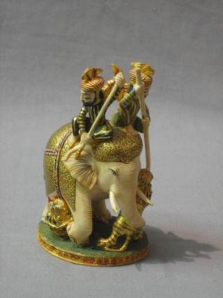A carved ivory figure of a Tiger hunt with elephant and attendants 5"