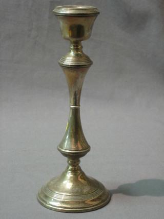 A silver candlestick, Birmingham 1976, 8 ozs