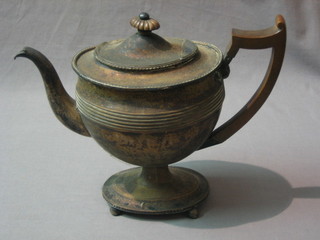 A 19th Century Georgian style oval silver plated teapot, raised on 4 bun feet
