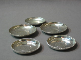 5 circular Eastern silver ashtrays inset coins, approx 9 ozs