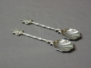 A pair of Victorian silver caddy spoons decorated the Arms of the Worshipful Company of Salters, London 1895 5 ozs