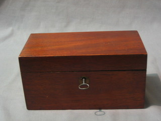 A Victorian mahogany twin compartment tea caddy with hinged lid 8"