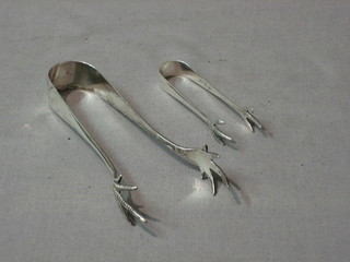 2 pairs of silver ice tongs, 1 oz