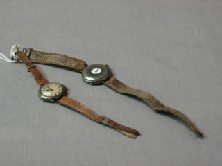 A lady's demi-hunter wristwatch contained in a Continental silver case and 1 other silver cased wristwatch