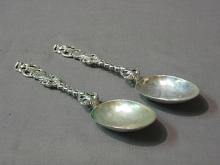 A pair of Scots silver serving spoons with pierced handles and picture backs, Edinburgh 1897, 4 ozs