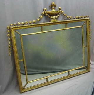 A 19th Century Georgian style plate mirror contained in a gilt frame surmounted by an urn with swag decoration 36" x 48"