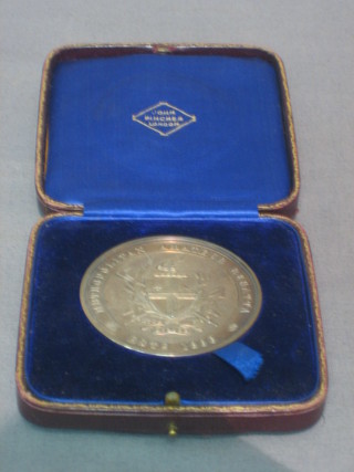 A silver rowing medallion for the Nick Carlton Amateur Regatta
