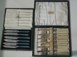 A set of 6 silver plated fish knives and forks and a set of 6 tea knives