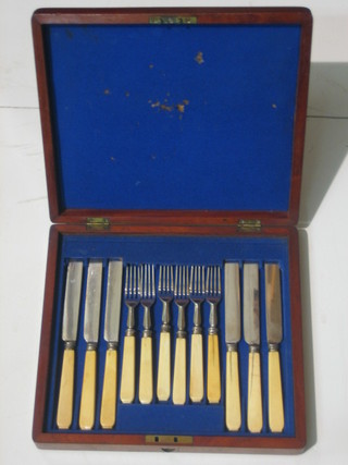 A set of 6 silver plated fruit knives with bone handles in a mahogany canteen box