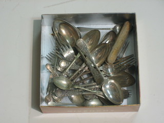 A small collection of silver plated flatware