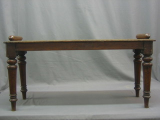 A 19th Century rectangular oak hall bench, raised on turned supports 36"