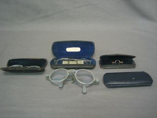 3 pairs of glasses and a spy glass