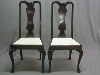 A pair of Queen Anne style mahogany slat back dining chairs