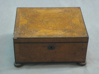 A Victorian rectangular figured walnut box with hinged lid, raised on bun feet 12"