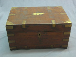 An Eastern hardwood strong box with brass banding and hinged lid and fitted interior 18"