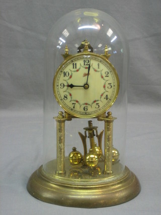 A 400 day clock with enamelled dial and Arabic numerals, contained in a gilt metal case complete with dome