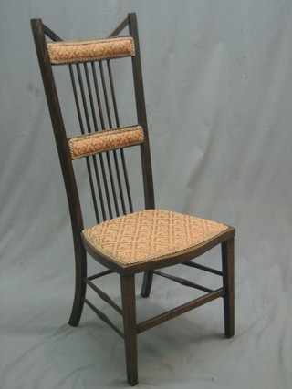 An Arts & Crafts mahogany stick and bar back carver chair together with a dining chair (2)