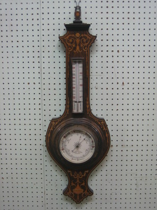 An Edwardian aneroid wheel barometer and thermometer contained in an inlaid mahogany case by Gallichan of Royal Square Jersey 