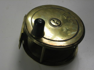 A Farlow brass patent lever reel no. 651, the reverse with coin slot control marked Charles Farlow Makers 119 The Strand, London, 4 1/2" 