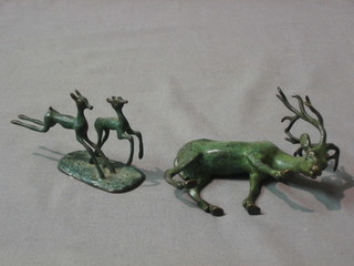 A verdigris bronze figure of a stag 3" and a bronze figure of 2 running deer 3"