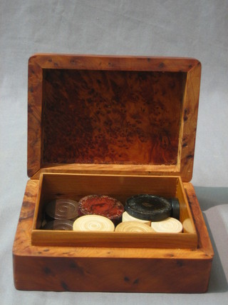A yew trinket box with hinged lid containing various drafts 6"