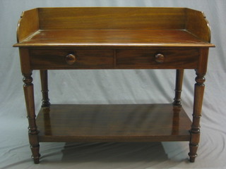 A Victorian mahogany wash stand with three-quarter gallery and 2 short drawers, raised on turned supports with undertier 41"