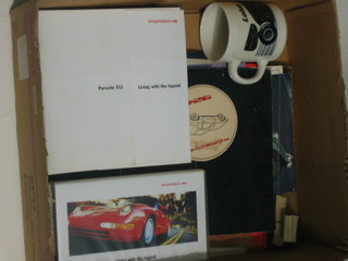 A collection of promotional and other motoring ephemera relating to Porsche, Lotus etc, sundry motoring books and  John Player cigarette cards Motor Cars series one and series two