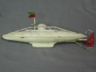 A 1926 clockwork metal model of a submarine 10" with propeller and key