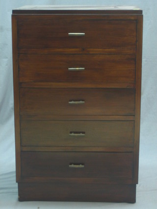 An Art Deco walnut pedestal chest of 5 long drawers, raised on a platform base 32"
