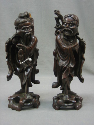 A pair of carved rootwood figures of sages 14"