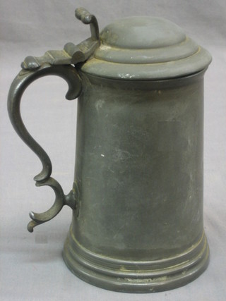 A lidded pewter tankard with glass base