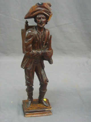 A Continental carved figure of a standing minstrel 16" (f)