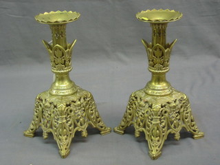 A pair of Victorian pierced brass candlesticks 10"