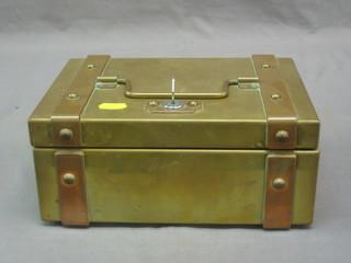 A rectangular brass and copper cash box with hinged lid 10"