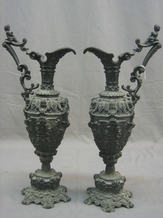 A pair of 19th Century spelter ewers 16"