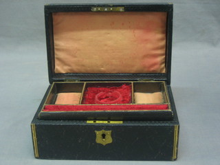 A Victorian leather jewellery box with hinged lid 13"