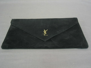 A lady's clutch bag marked YSL