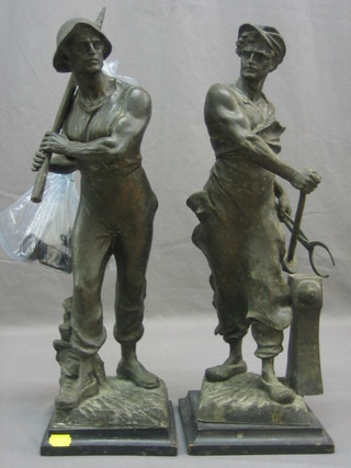 A pair of 19th Century spelter figures depicting woodsman and blacksmith 21"