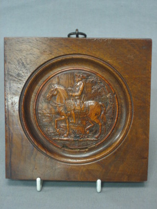 A circular carved wooden plaque depicting a mounted Nobleman 3"