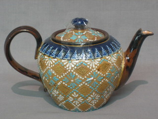 A Doulton Lambeth Doulton & Slater salt glazed teapot