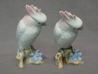 2 Royal Dux figures of seated cockatoos, the base with pink mark, impressed 348 7"