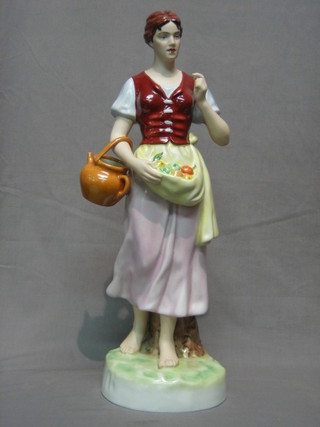 A Royal Dux porcelain figure of a standing girl with basket of fruit, the base with pink Royal Dux mark and a blue Royal Dux printed mark, 19"