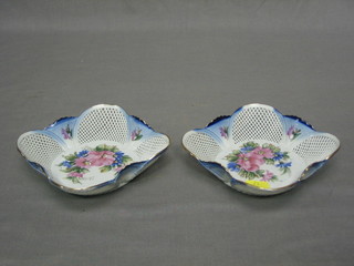 A pair of Continental square pierced porcelain baskets with floral decoration 5"